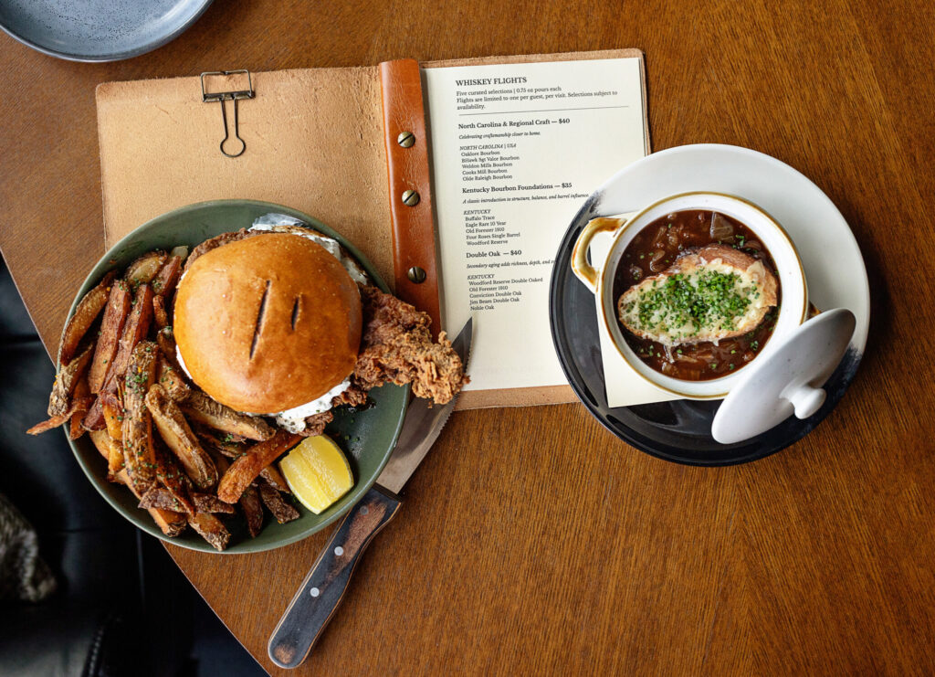 Best restaurants in Hendersonville, NC featuring seasonal brunch and dinner with farm-to-table dishes, buttermilk waffles, eggs, salads, steaks, pastas, burgers and craft cocktails.