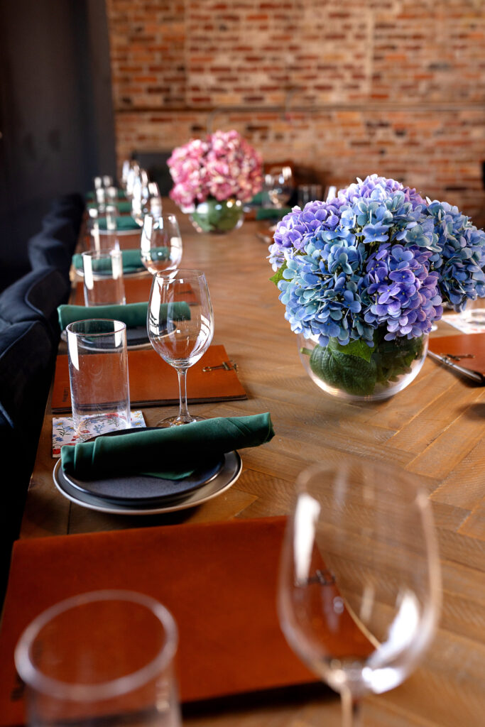 Best Private dining event space in Hendersonville, NC and Asheville, NC with an intimate private dining room, farm table seating, and warm, upscale atmosphere for celebrations and corporate events.