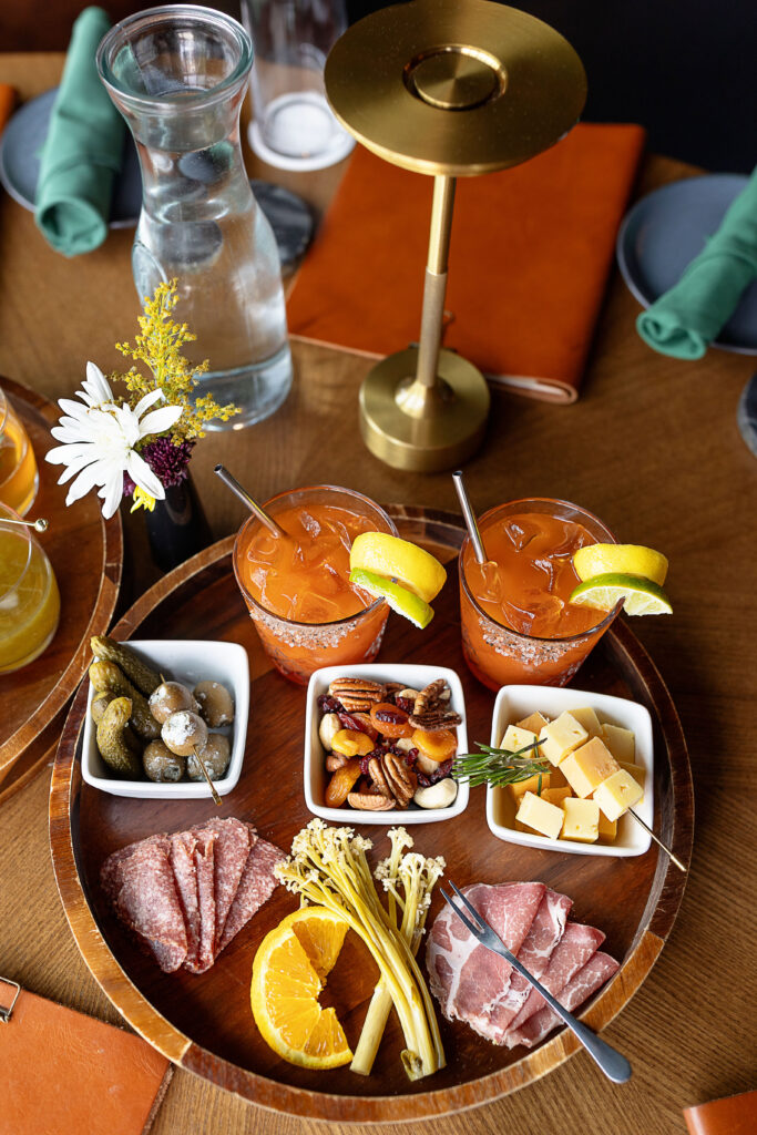 Best restaurants in Hendersonville, NC featuring seasonal brunch and dinner with farm-to-table dishes, buttermilk waffles, eggs, salads, steaks, pastas, burgers and craft cocktails.