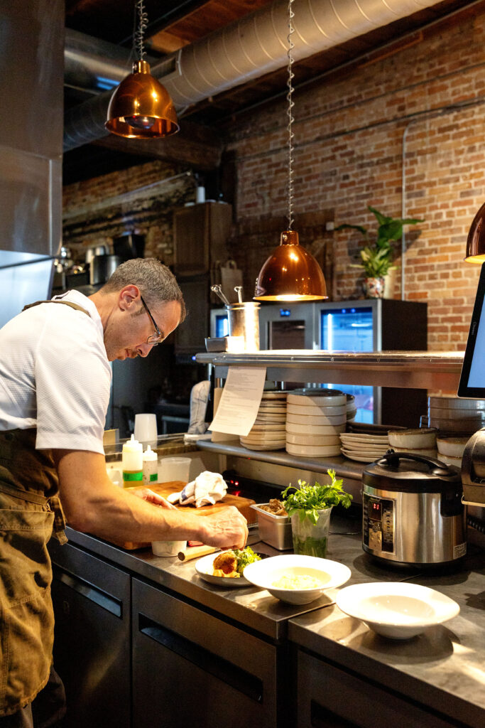 Best restaurants in Hendersonville, NC featuring seasonal brunch and dinner with farm-to-table dishes, buttermilk waffles, eggs, salads, steaks, pastas, burgers and craft cocktails.