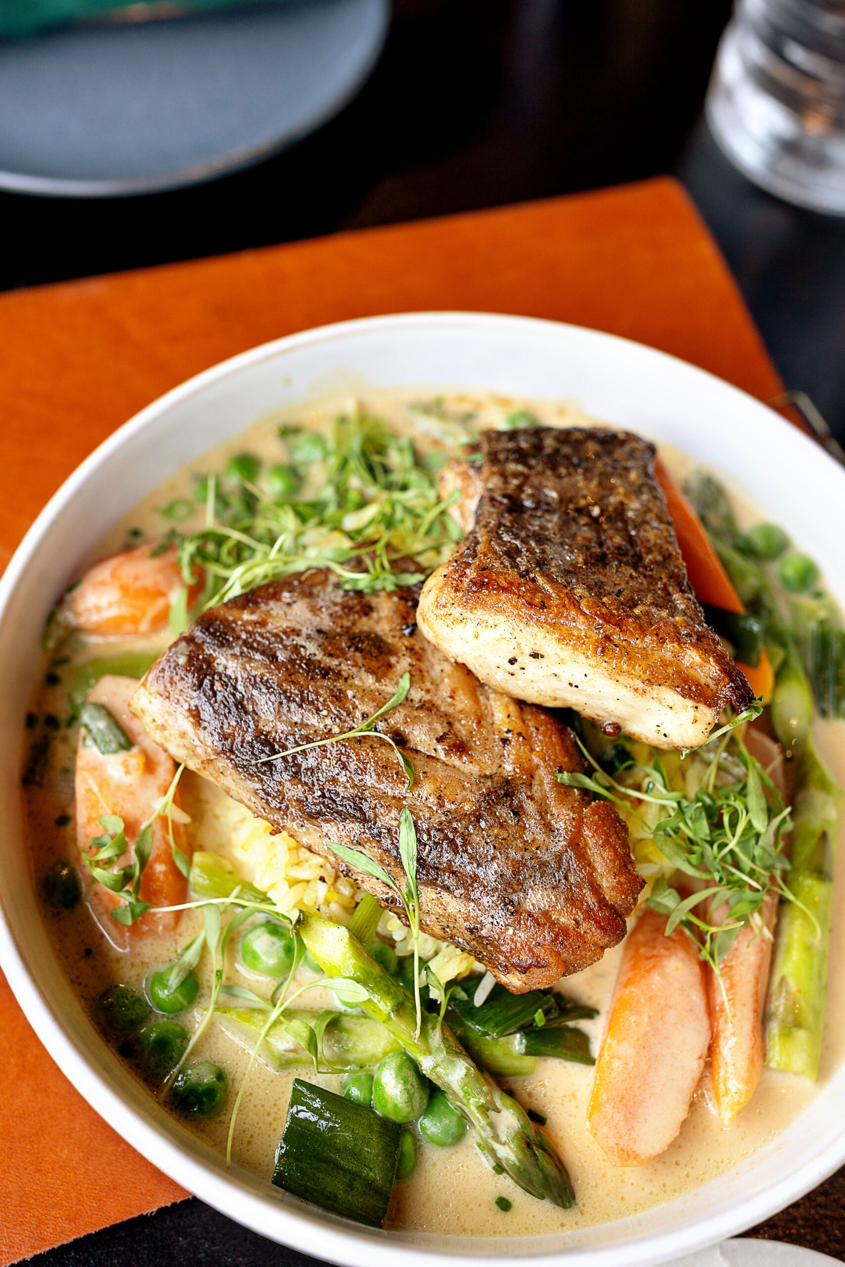 Best restaurants in Hendersonville, NC featuring seasonal brunch and dinner with farm-to-table dishes, buttermilk waffles, eggs, salads, steaks, pastas, burgers and craft cocktails.