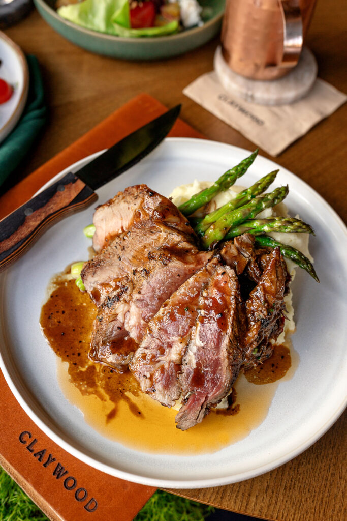 Best restaurants in Hendersonville, NC featuring seasonal brunch and dinner with farm-to-table dishes, buttermilk waffles, eggs, salads, steaks, pastas, burgers and craft cocktails.