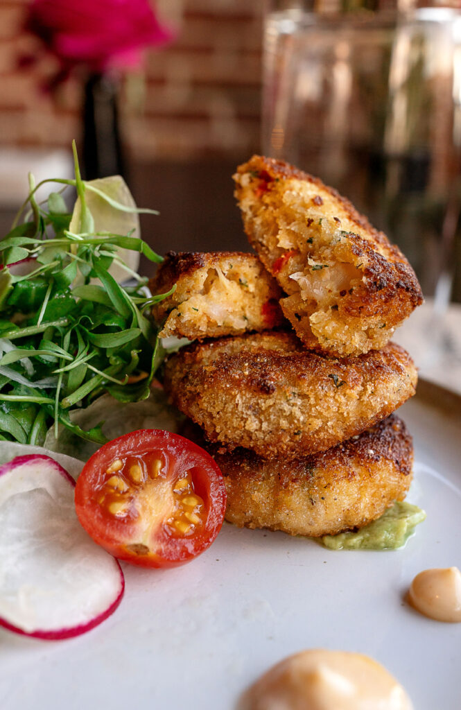 Best restaurants in Hendersonville, NC featuring seasonal brunch and dinner with farm-to-table dishes, buttermilk waffles, eggs, salads, steaks, pastas, burgers and craft cocktails.