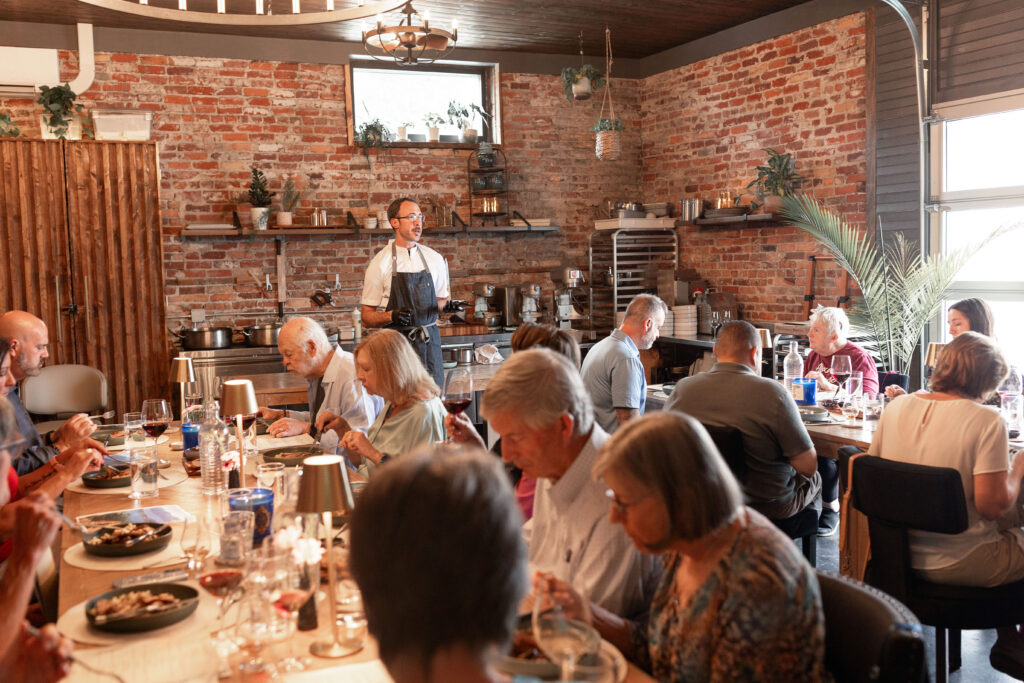 Best restaurants in Hendersonville, NC featuring seasonal brunch and dinner with farm-to-table dishes, buttermilk waffles, eggs, salads, steaks, pastas, burgers and craft cocktails.