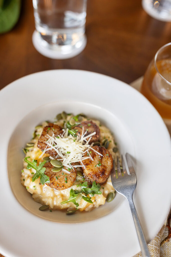 Best restaurants in Hendersonville, NC featuring dinner with farm-to-table dishes, salads, steaks, pastas, burgers and craft cocktails.