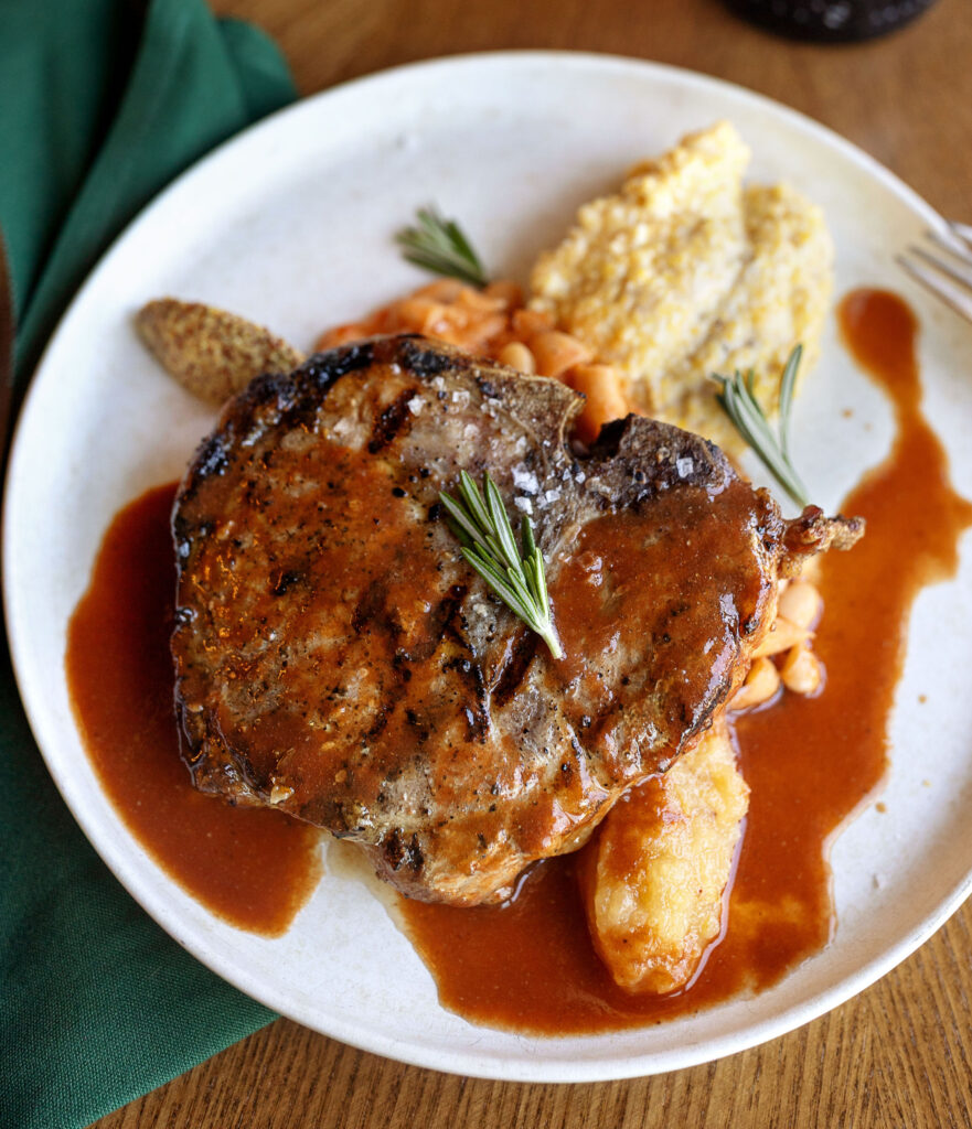 Best restaurants in Hendersonville, NC featuring dinner with farm-to-table dishes, salads, steaks, pastas, burgers and craft cocktails.